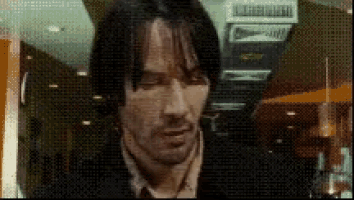 a close up of a man 's face in a blurry photo