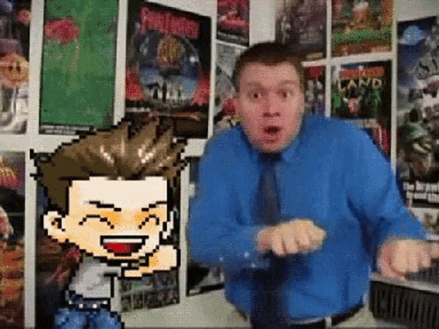 a man in a blue shirt and tie is standing in front of a wall with posters on it including one that says fun for boys