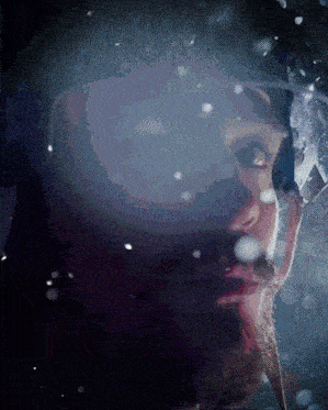 a close up of a person 's face with a helmet on