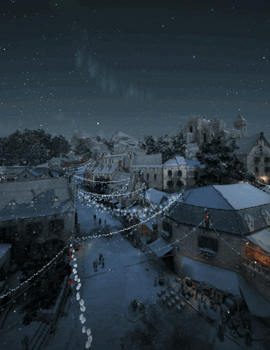 an aerial view of a snowy town at night with the aurora borealis in the background