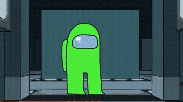 a green among us character is standing in a dark room .