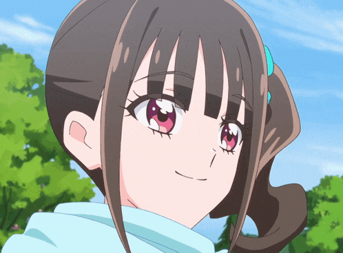 a close up of a girl 's face with pink eyes
