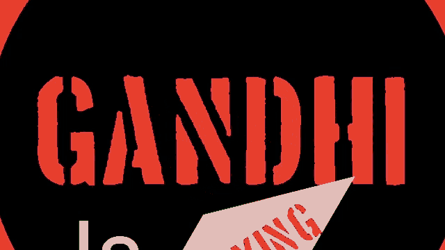 a sign that says gandhi is lying in red on a black background
