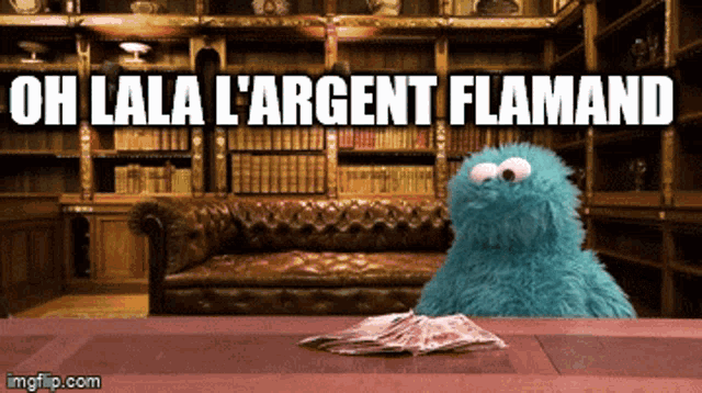 a cookie monster is sitting at a table with a pile of money and the words oh lala l' argent flamand