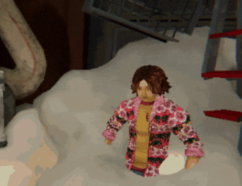 a doll in a floral jacket is standing in a pile of snow