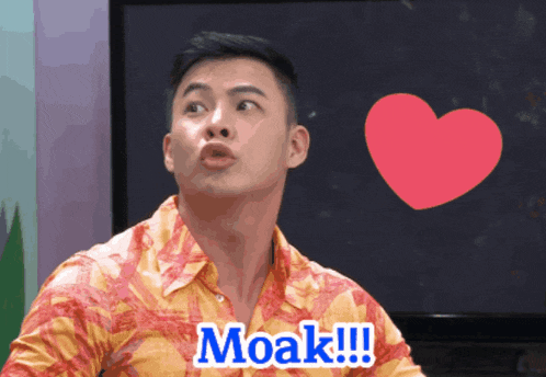 a man in a hawaiian shirt says moak in front of a heart