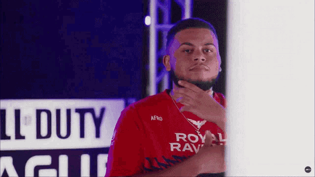 a man in a red shirt that says afro on the front
