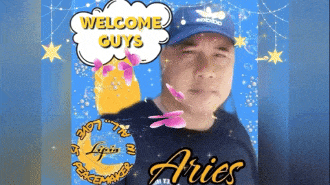 a man wearing a blue hat with the words welcome guys on it