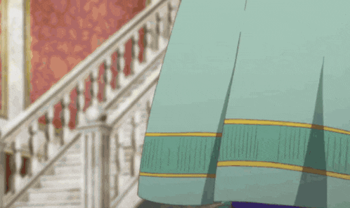 a close up of a person 's skirt with a green and gold stripe