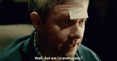 a man has a sticky note on his forehead that says yeah but am i a pretty lady .