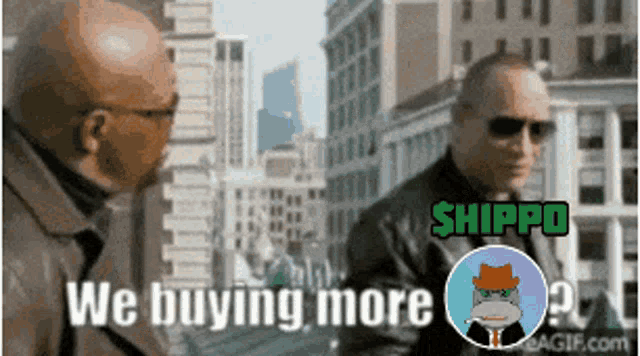 two men are talking in front of a city and the words we buying more are visible
