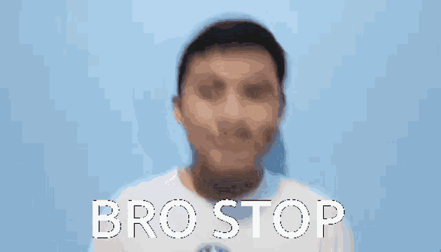 a man in a white shirt is making a funny face with the words bro stop behind him .