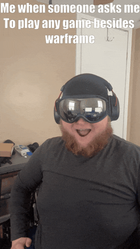 a man with a beard wearing goggles and headphones with a caption that says me when someone asks me