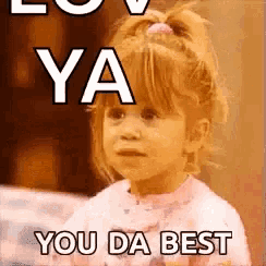 a little girl with a ponytail is looking at the camera with a meme that says you da best