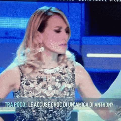a woman in a sequined top with the words tra poco le accuse choc di un amico di anthony