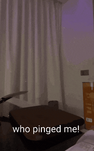 a person is holding a knife over a cutting board and the words who pinged me are on the bottom