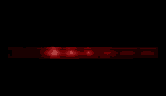 a red light is shining in the dark .