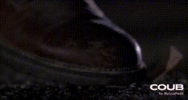 a close up of a jar filled with powder and a light shining through it .