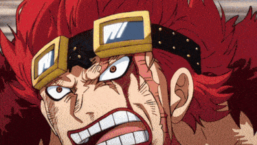 a close up of a cartoon character with red hair and goggles on his head