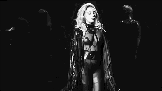 a black and white photo of lady gaga with a caption that says " hy , to tyt ? "