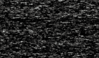 a black and white image of a gray object on a black background .