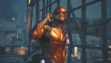 a man in a superhero costume has a lightning bolt on his chest
