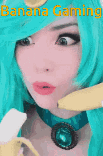 a woman with blue hair is holding a banana in her mouth and the words banana gaming are above her