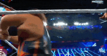 a man in a boxing ring with fox sports written on the screen