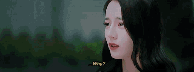 a close up of a woman 's face with the words why on the bottom .