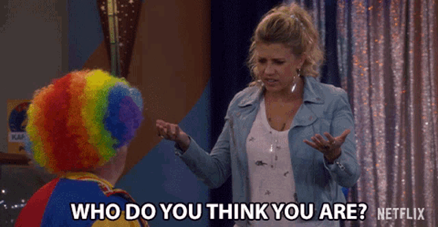 a woman is talking to a clown who is wearing a rainbow wig and says who do you think you are netflix
