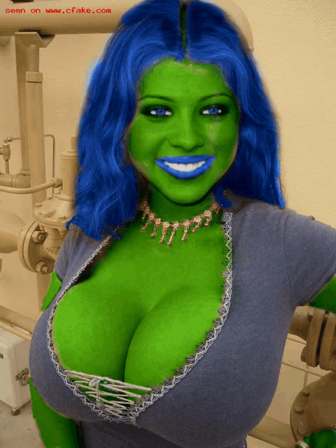 a green woman with blue hair is seen on www.cfake.com