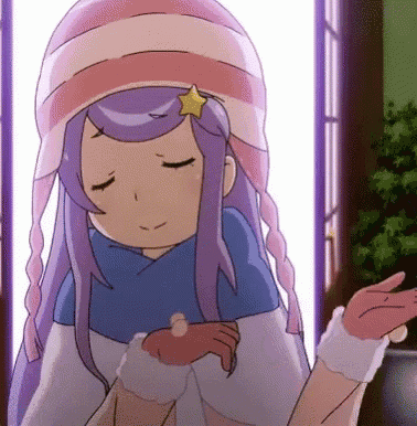 a girl with purple hair and a star on her head