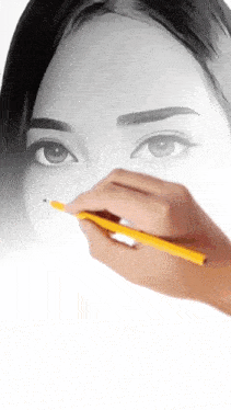 a woman 's face is being drawn with a yellow pencil