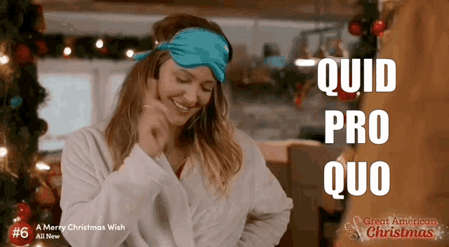 a woman wearing a sleep mask is smiling and says " quid pro quo "