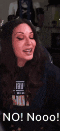 a woman wearing a black shirt that says ibu on it says no nooo