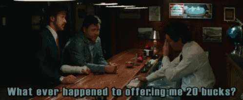 a group of men are sitting at a bar and one of them says it 's the recession