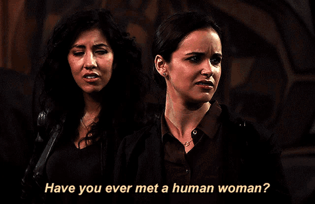 two women are standing next to each other with the words " have you ever met a human woman " above them