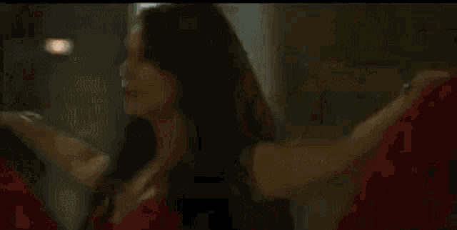 a pixelated image of a person 's face with a blurred background that says ' a ' on it