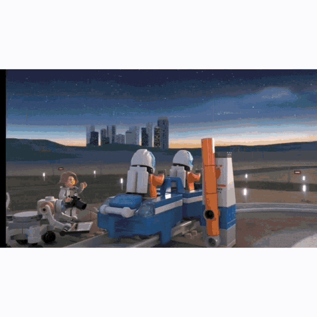 a lego scene with a city in the background and a sign that says no entry