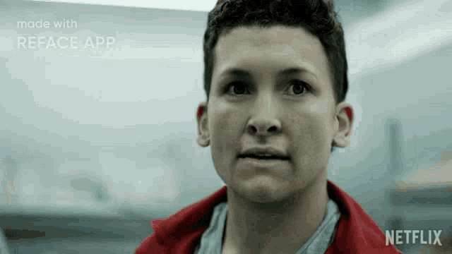 a man in a red jacket is looking at the camera with a netflix logo behind him