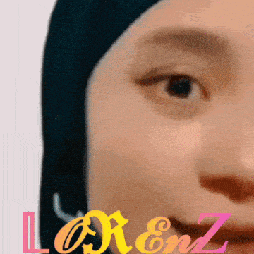 a close up of a woman 's face with the name lorenz on the bottom right