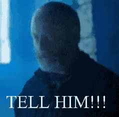 a man with a beard and the words tell him !!!