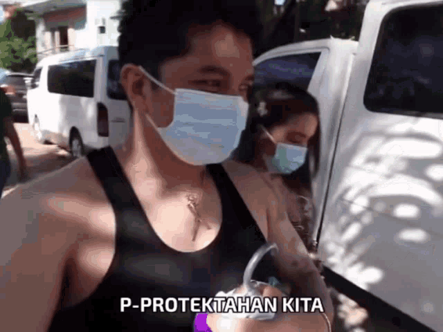 a man wearing a mask says p-protektahan kita in a video