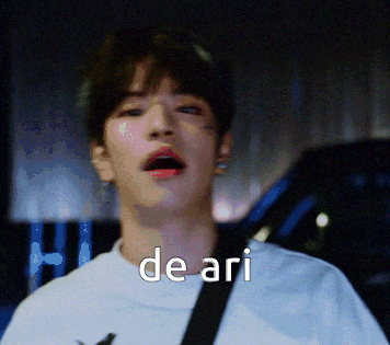 a close up of a man 's face with the word de ari written on it