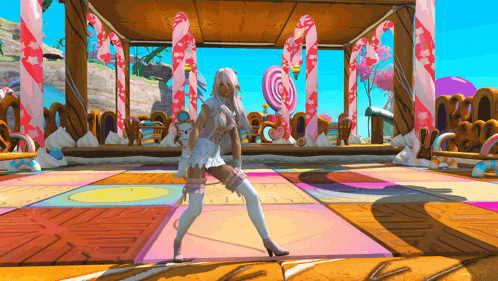 a woman in a white dress is dancing on a colorful floor with candy canes in the background