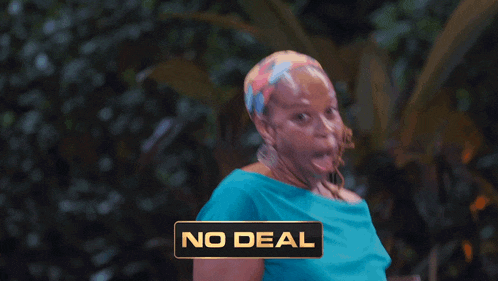 a woman in a blue shirt with a no deal sign