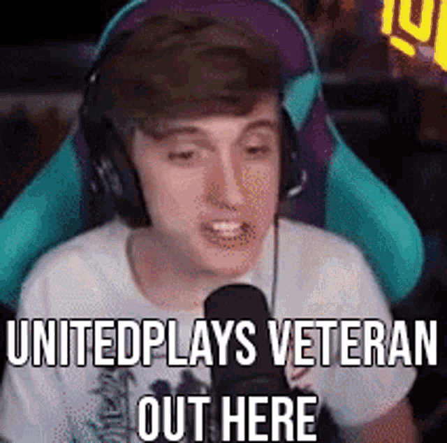 a young man wearing headphones is sitting in front of a microphone and says `` united plays veteran out here '' .