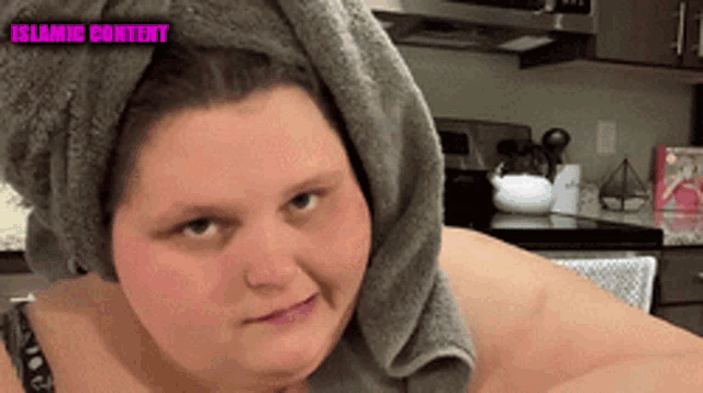 a woman with a towel wrapped around her head has islamic content written on the bottom