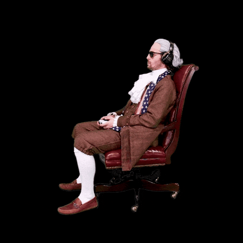 a man wearing a wig and headphones is sitting in an office chair playing a video game
