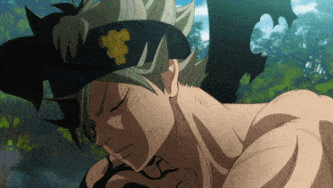 a close up of a man with a black headband on